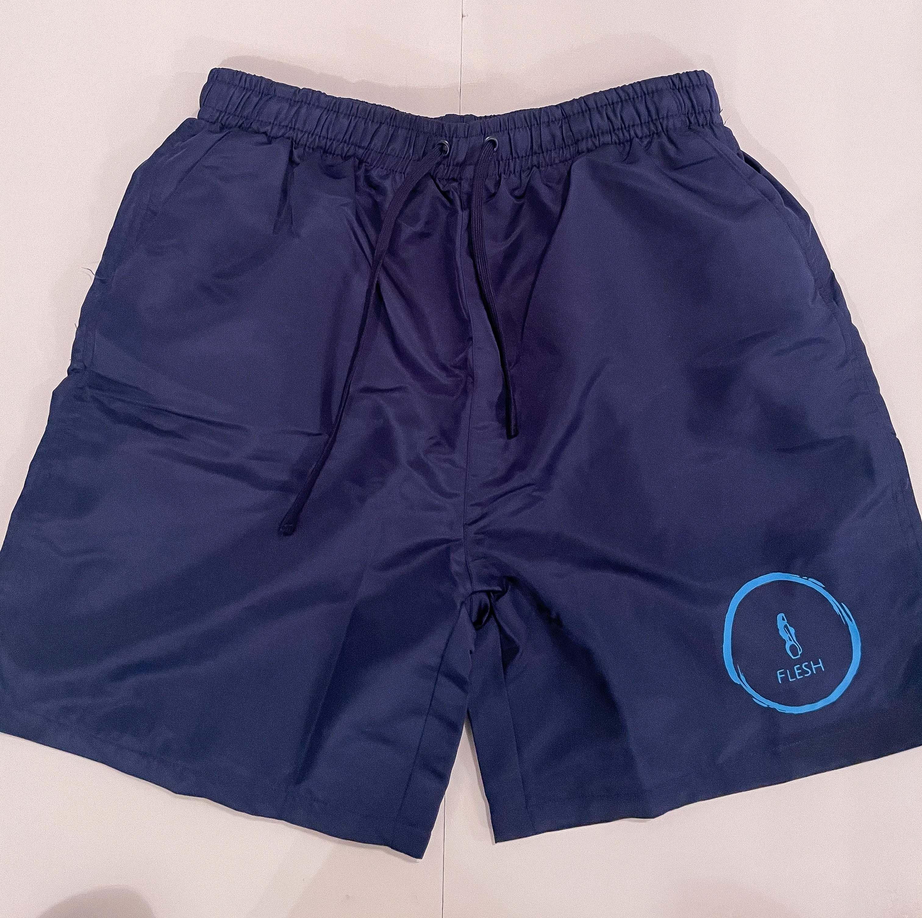 Flesh navy blue trunks